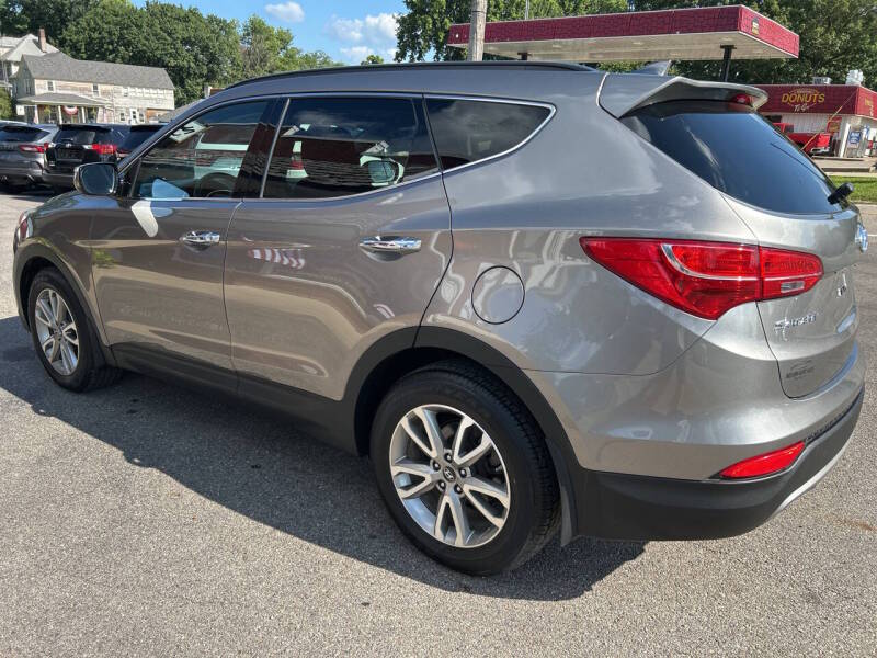 hyundai santa fe 2014 5XYZUDLA5EG212093 image hyundai santa fe 2014 5XYZUDLA5EG212093 image